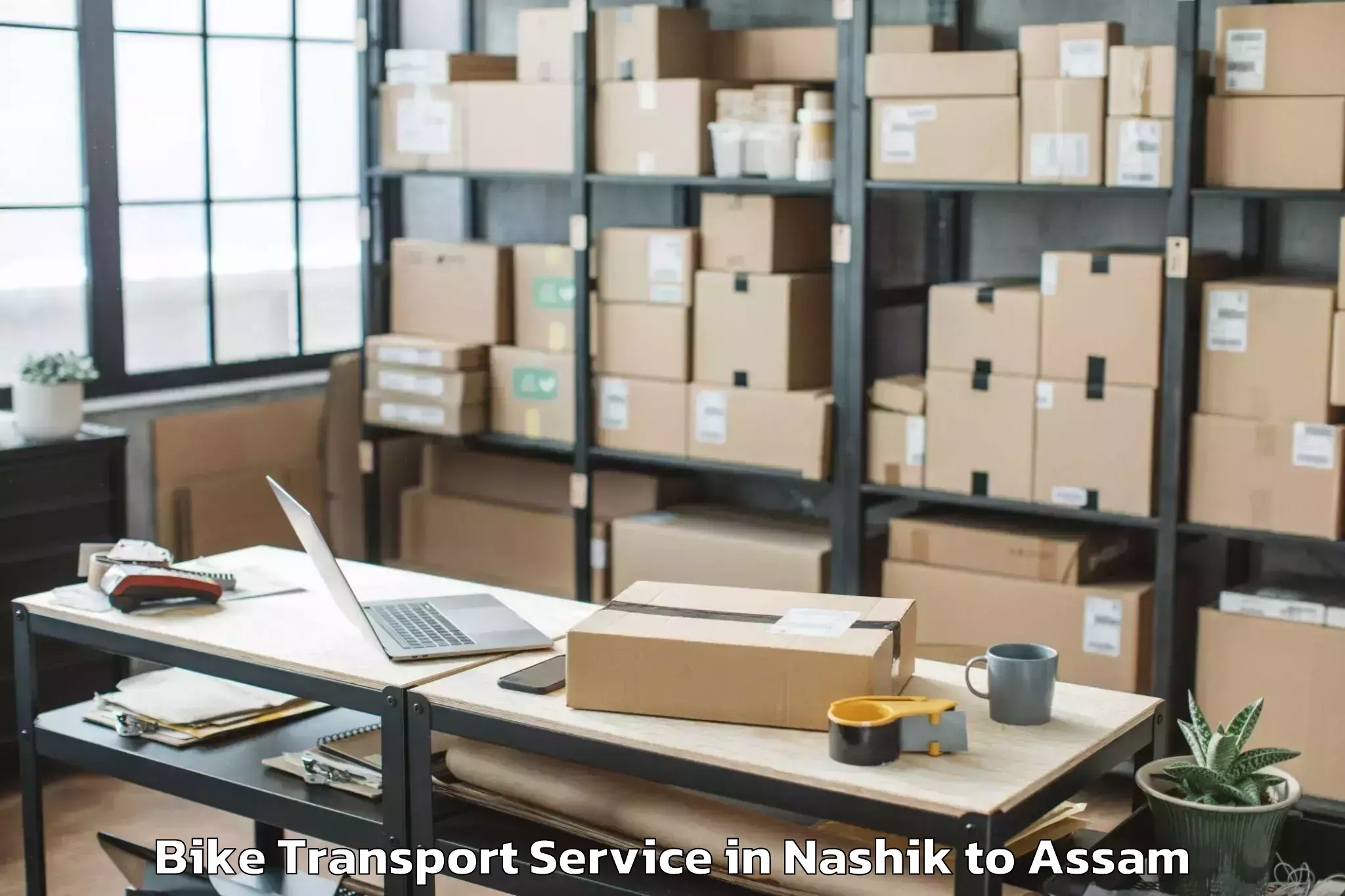 Top Nashik to Silapathar Bike Transport Available